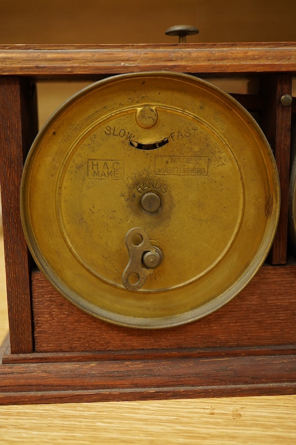 A William Tanner 'The Reliable Chess Timer' in an oak case, stamped to the reverse ‘HAO Make, Made in Wurttemberg’. Condition - fair to good.